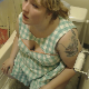 A fat, blonde girl with a shoulder tattoo takes a runny-sounding, wet shit and a piss while sitting on a toilet. She also picks her nose. Glimpse of product seen in toilet when she stands up and flushes. Presented in 720P HD. About 5 minutes.